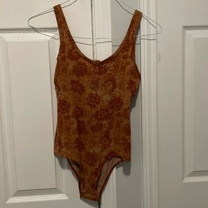 Orange flower bodysuit